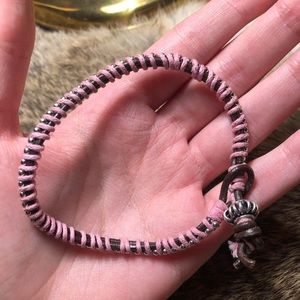 Silver toned pink thread, brown leather and silver bead wrapped bracelet